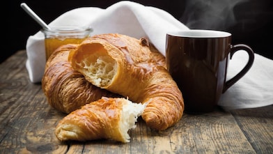 Croissant and Mug on a wooden table